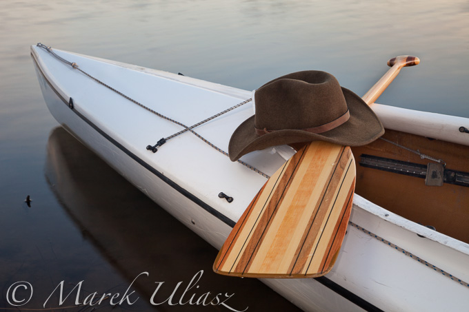 paddle, hat and canoe